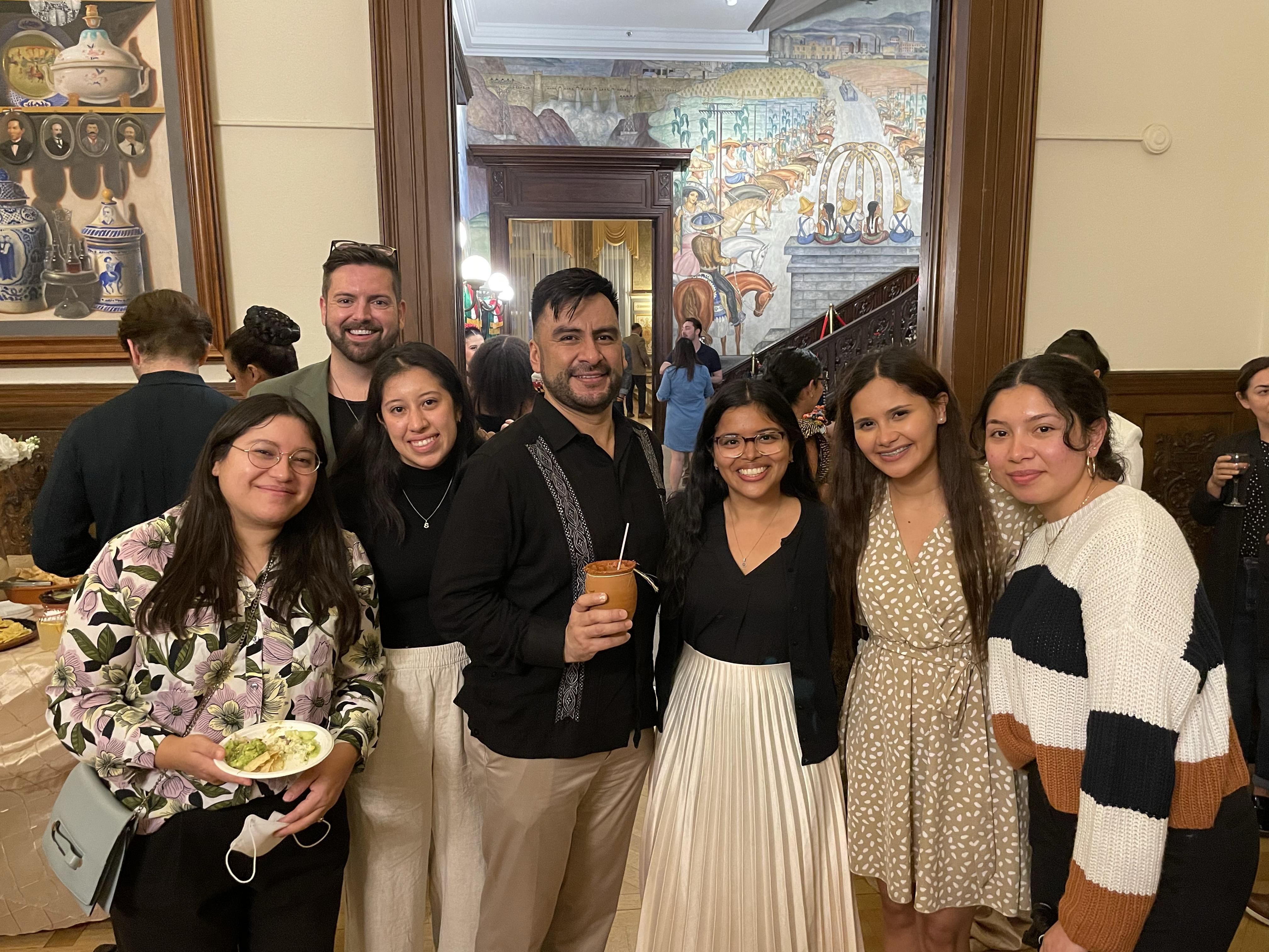 Group photo featuring Dr. Manuel Cuellar and Emma Ramos