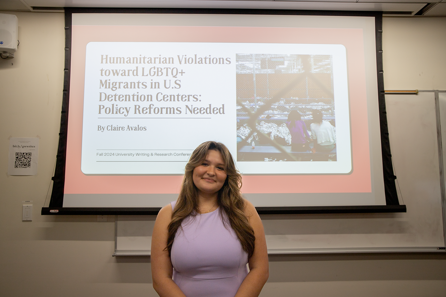 Student in front of a PowerPoint presentation