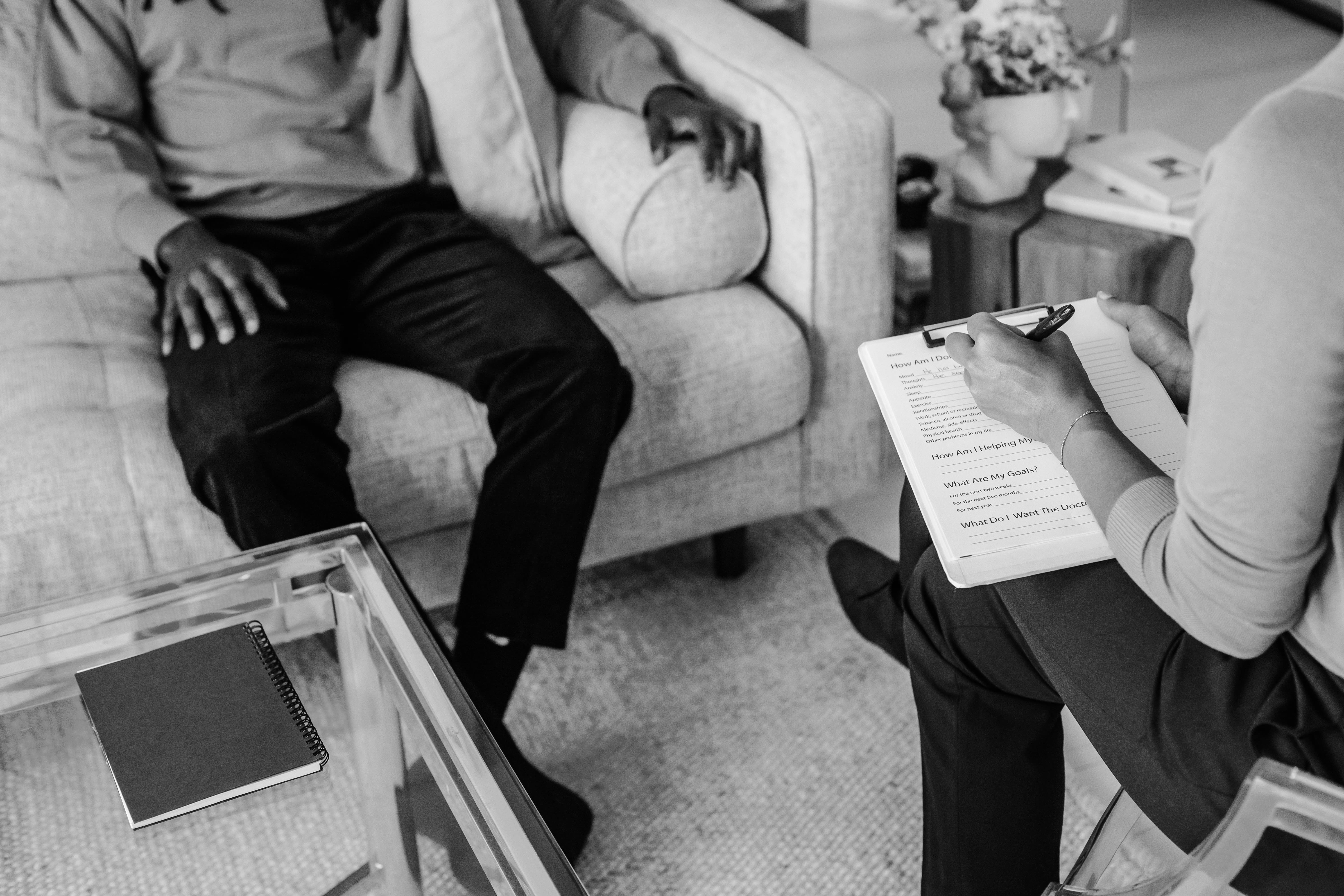 black and white image of a therapy session