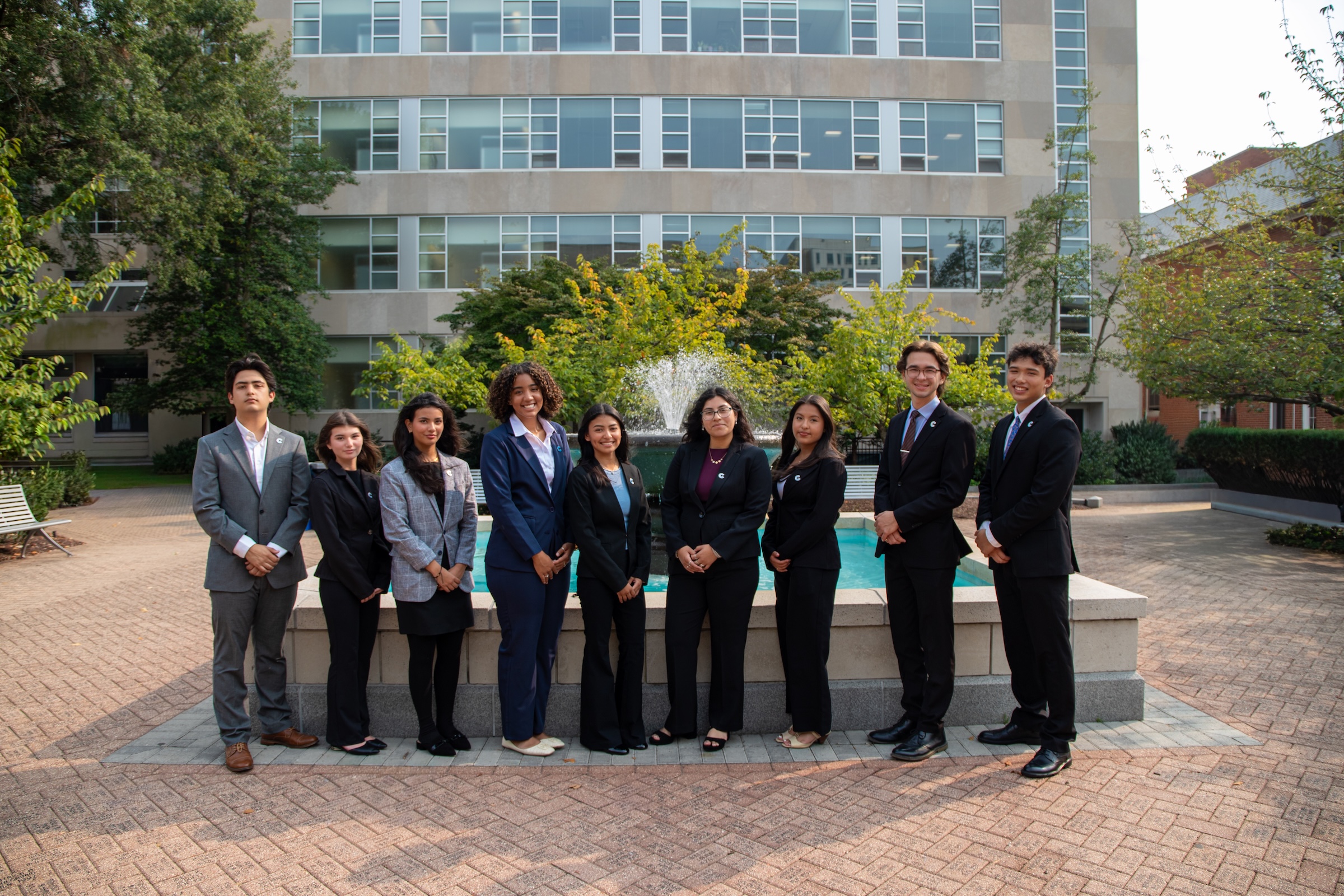 Group of Cisneros Scholars pose in Kogan Plaza