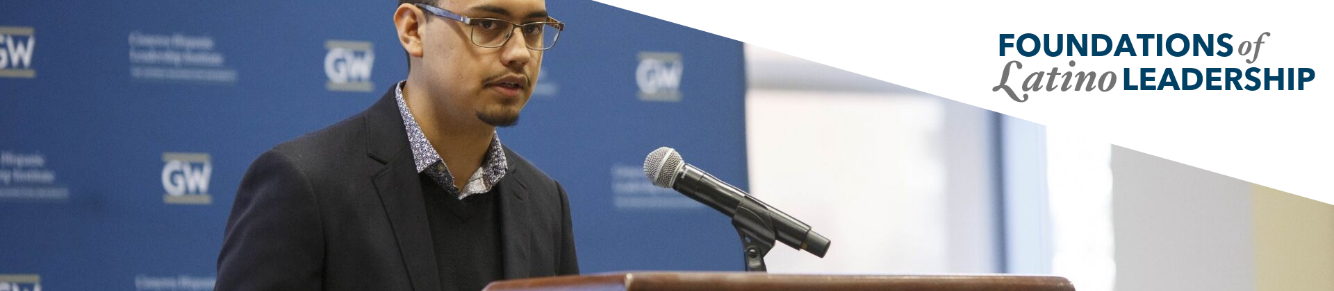 Foundations of Latino Leadership: a young Latino speaks into a lectern