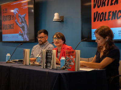 Three individuals sitting on a panel