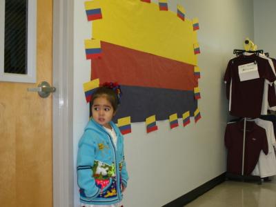 Young student standing outside of classroom