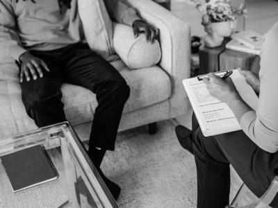 black and white image of a therapy session