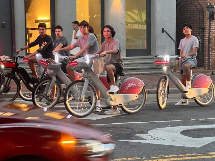 Group of students riding bikes