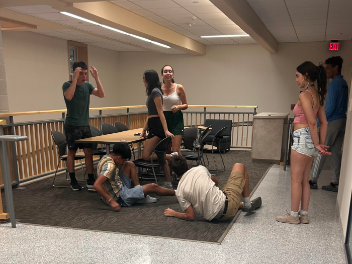 A group of students improving 