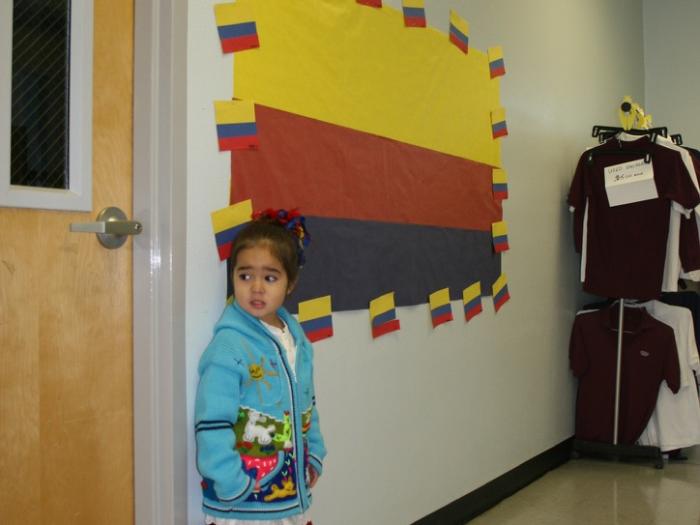 Young student standing outside of classroom