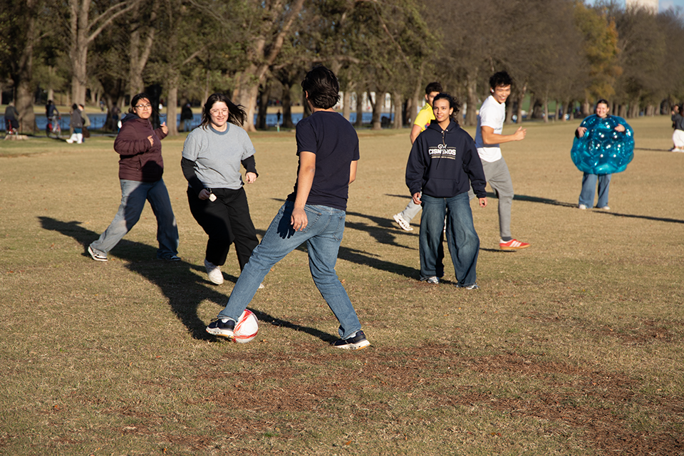 Cisneros Scholars playing soccer at annual Field Day