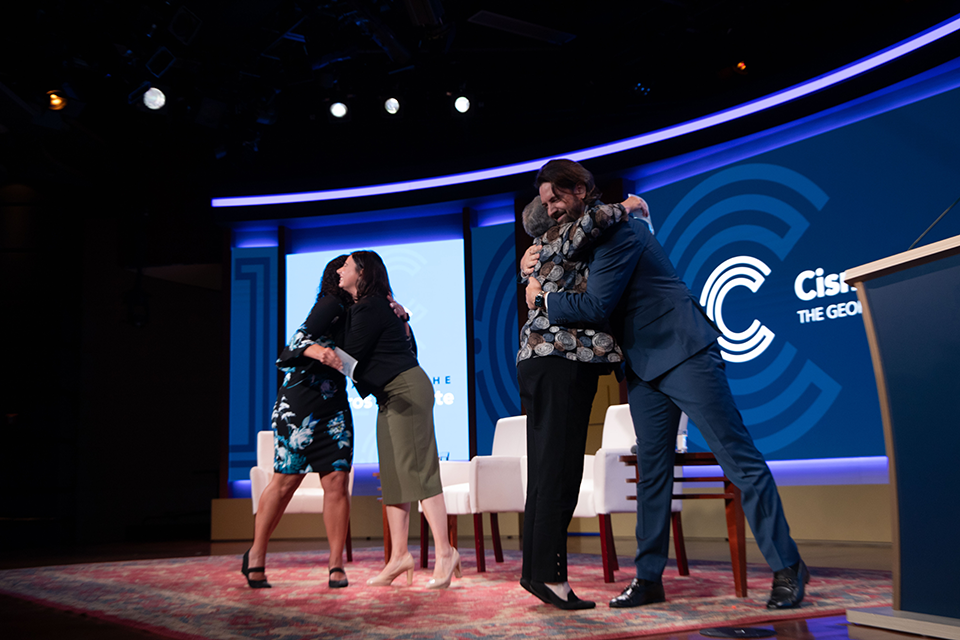 Cisneros Institute Executive Director, Elizabeth Vaquera, and Deputy Director, Trey Johnston, presenting leadership development award to Nicole Encarnacao Bartels and Dr. Janice Shack-Márquez at 10-year anniversary