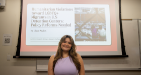Student in front of a PowerPoint presentation