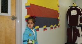 Young student standing outside of classroom
